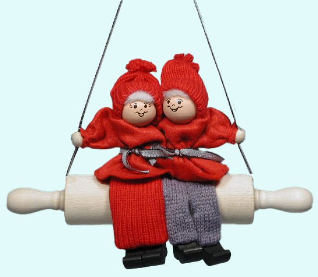 Tomte couple on rolling pin