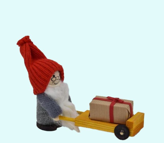 Tomte w/ package on wheelbarrow