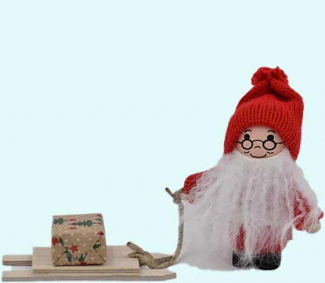 Tomte w/ package on sled