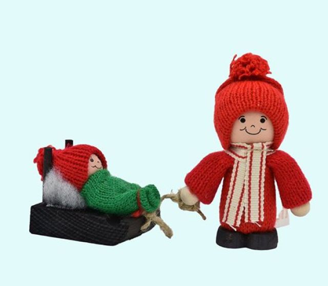 Tomte boy w/kid on sled