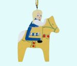 Swedish girl on yellow Dalahorse