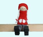 Tomte girl sitting