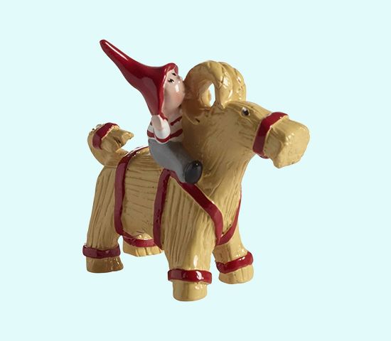 Tomte kid on straw goat