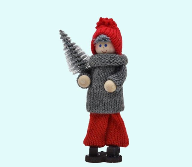 Tomte boy carrying silver tree